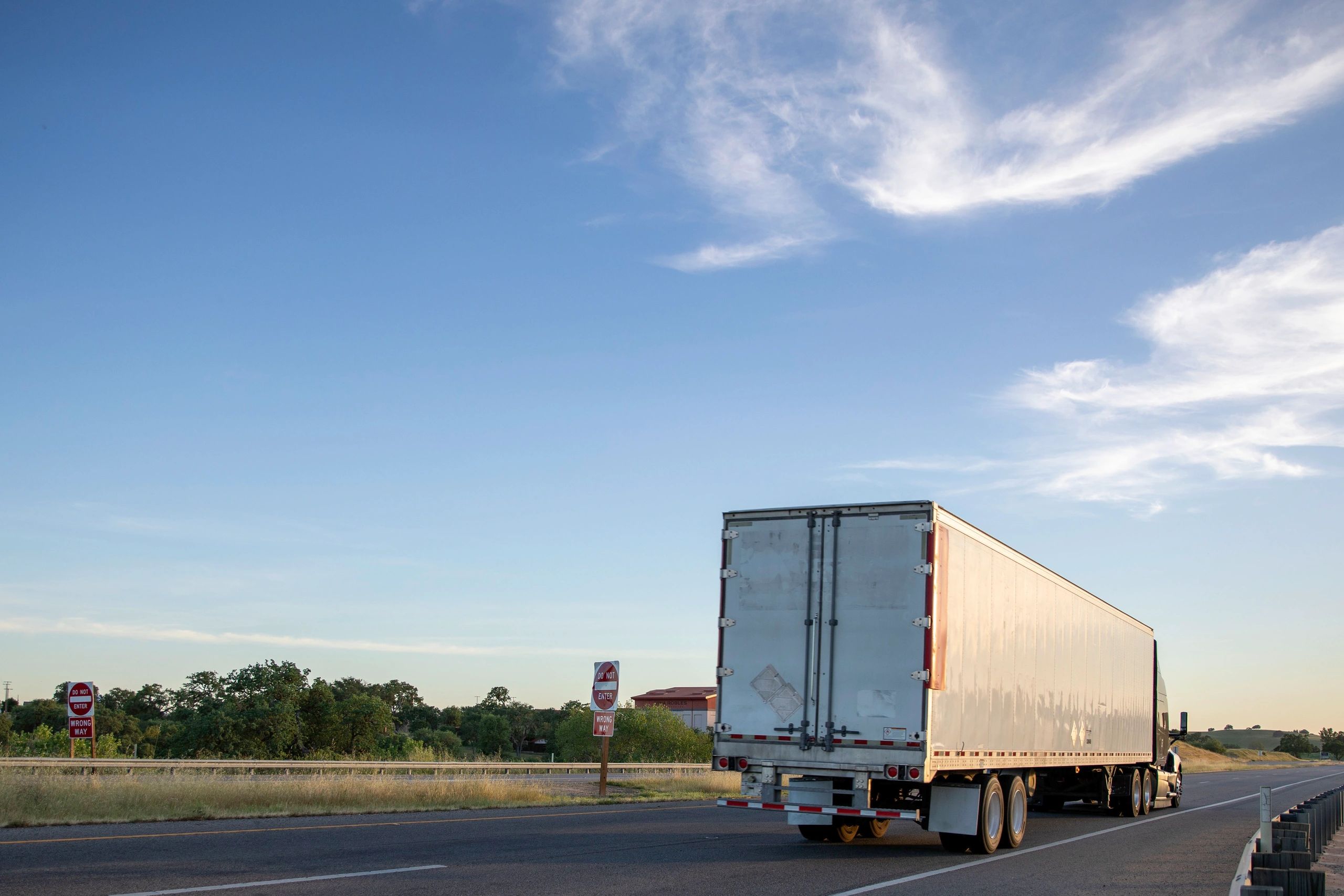 Truck traveling on highway for long-distance moving
